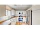 Modern kitchen featuring stainless steel appliances, gas range, and white cabinetry at 9116 Tailor Made Ave, Las Vegas, NV 89149