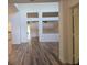 Open-concept living room featuring hardwood floors and ample natural light at 9329 Fresh Spring Dr, Las Vegas, NV 89134