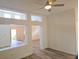 Bright living room featuring wood floors and an open floor plan at 9329 Fresh Spring Dr, Las Vegas, NV 89134