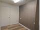 Room with wood flooring and access to rooms at 9329 Fresh Spring Dr, Las Vegas, NV 89134
