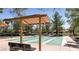 Outdoor shuffleboard courts with shaded seating areas, ideal for leisurely games and socializing at 9329 Fresh Spring Dr, Las Vegas, NV 89134
