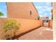 A private gravel backyard with access gate, ready for your creative touch at 9704 Morgan Creek Ct, Las Vegas, NV 89141