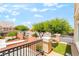 Inviting balcony area with outdoor seating, providing an outdoor space to relax and enjoy the views at 9704 Morgan Creek Ct, Las Vegas, NV 89141