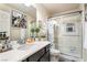 Bathroom with a vanity and a shower with sliding glass doors at 9704 Morgan Creek Ct, Las Vegas, NV 89141