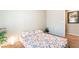 Bedroom featuring floral bedding and a plant at 9704 Morgan Creek Ct, Las Vegas, NV 89141