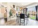 Comfortable dining area near a staircase, and featuring an outdoor view at 9704 Morgan Creek Ct, Las Vegas, NV 89141
