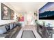 Cozy living room features modern decor, comfortable seating, and an entertainment center at 9704 Morgan Creek Ct, Las Vegas, NV 89141