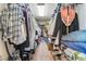 Spacious walk-in closet with shelving units, clothes and accessories at 9704 Morgan Creek Ct, Las Vegas, NV 89141