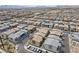 Vast planned community seen from above, showcasing modern homes and a grid street layout at 9929 Bumblebee Hills St, Las Vegas, NV 89141