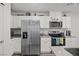 Clean kitchen with stainless steel refrigerator and modern appliances at 9929 Bumblebee Hills St, Las Vegas, NV 89141