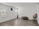 Spacious living room with wood floors, lots of light and simple decor at 9929 Bumblebee Hills St, Las Vegas, NV 89141