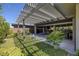 Lush backyard with a covered patio and landscaping for outdoor enjoyment at , Las Vegas, NV 89148