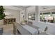 Well-lit dining room offering seamless views into the kitchen, living room, and backyard at , Las Vegas, NV 89148