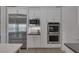 Bright kitchen with stainless steel appliances and white cabinets offering a modern and clean aesthetic at , Las Vegas, NV 89148