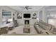 Bright living room with a fireplace, ceiling fan, and comfortable seating area offering a cozy and inviting atmosphere at , Las Vegas, NV 89148