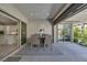 Inviting covered patio with an outdoor dining set and access to the home's kitchen at , Las Vegas, NV 89148