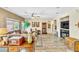 Bright living room showcasing neutral colors, a ceiling fan, and modern decor at 10420 Loma Portal Ave, Las Vegas, NV 89166