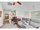 Spacious loft area with comfortable seating, desk, and ample natural light, perfect for a home office or relaxation at 10420 Loma Portal Ave, Las Vegas, NV 89166