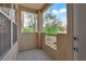 Cozy balcony with views of trees and buildings at 10550 W Alexander Rd # 2079, Las Vegas, NV 89129
