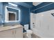Modern bathroom features a sleek vanity, illuminated mirror, and a shower-tub combination at 10550 W Alexander Rd # 2079, Las Vegas, NV 89129