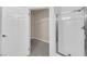 Well-organized walk-in closet attached to a bright bathroom with glass shower at 10550 W Alexander Rd # 2079, Las Vegas, NV 89129