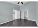 Spacious bedroom with stylish flooring and neutral wall color, featuring multiple entryways at 10550 W Alexander Rd # 2079, Las Vegas, NV 89129