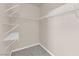 Walk-in closet with organized shelving for optimal storage and organization at 10550 W Alexander Rd # 2079, Las Vegas, NV 89129