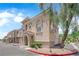 Well-maintained two-story home with a private garage and manicured landscaping at 10550 W Alexander Rd # 2079, Las Vegas, NV 89129