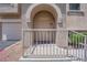 Close-up of front door, showcasing the entryway with charming details and a secure entrance at 10550 W Alexander Rd # 2079, Las Vegas, NV 89129