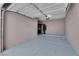 Clean garage space with epoxy floors and ample storage at 10550 W Alexander Rd # 2079, Las Vegas, NV 89129
