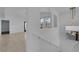 Bright hallway featuring a view of other rooms at 10550 W Alexander Rd # 2079, Las Vegas, NV 89129