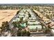 Aerial view of a well-maintained apartment complex with a community pool and green spaces, nestled among tree-lined streets at 1533 Linnbaker Ln # 102, Las Vegas, NV 89110