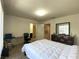 Comfortable bedroom with a queen bed, lots of natural light, and a neutral color scheme at 1533 Linnbaker Ln # 102, Las Vegas, NV 89110