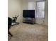 Bedroom with a large window, neutral walls, and carpeted floors at 1533 Linnbaker Ln # 102, Las Vegas, NV 89110