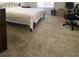 Cozy main bedroom with plush carpeting, light-blocking blinds, and space for a home office at 1533 Linnbaker Ln # 102, Las Vegas, NV 89110