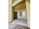 Exterior shot of a unit patio featuring security door and a desert landscape at 1533 Linnbaker Ln # 102, Las Vegas, NV 89110