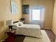 Bedroom with queen sized bed and window for natural light at 1667 Marion Bennet Dr, Las Vegas, NV 89106