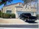 Charming single-story home with well-maintained landscaping and a private driveway, perfect for suburban living at 1667 Marion Bennet Dr, Las Vegas, NV 89106