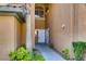 Covered entrance featuring a walkway leading to a white front door at 1713 Sky Of Red Dr # 203, Las Vegas, NV 89128