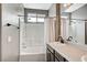 Bathroom with a shower and tub combination and a single sink vanity at 1829 Fighting Falcon Ln, North Las Vegas, NV 89031