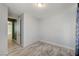 Bedroom with wood-look flooring and natural light at 1829 Fighting Falcon Ln, North Las Vegas, NV 89031