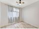 Bedroom with wood-look flooring, neutral paint, and natural light at 1829 Fighting Falcon Ln, North Las Vegas, NV 89031