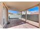 This home has a beautiful covered patio with a custom concrete floor and block wall to separate from the neighbors at 1829 Fighting Falcon Ln, North Las Vegas, NV 89031