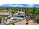 Expansive backyard features a sparkling pool, covered patio, and lush landscaping, perfect for outdoor entertaining at 1984 Troon Dr, Henderson, NV 89074