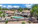 Beautiful backyard with a refreshing pool, covered patio, and well-maintained garden, ideal for relaxation at 1984 Troon Dr, Henderson, NV 89074