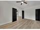 Bright bedroom with ceiling fan and adjacent room, perfect for relaxation at 1984 Troon Dr, Henderson, NV 89074