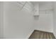 Walk-in closet with carpet and wire shelving perfect for keeping organized at 1984 Troon Dr, Henderson, NV 89074
