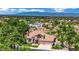 Stunning exterior of a well-maintained home surrounded by lush greenery and a beautifully landscaped yard at 1984 Troon Dr, Henderson, NV 89074
