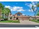 Beautiful home featuring a three-car garage, landscaped lawn, and classic curb appeal at 1984 Troon Dr, Henderson, NV 89074