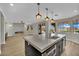 Open concept kitchen connected to living room with views of the backyard at 1984 Troon Dr, Henderson, NV 89074